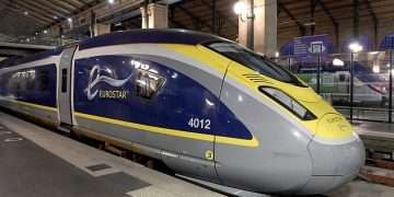 Migrant is electrocuted in human fireball after climbing on top of a UK-bound Eurostar train and getting struck by powerful charge from overhead cable