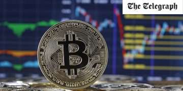 Bitcoin soars close to record high