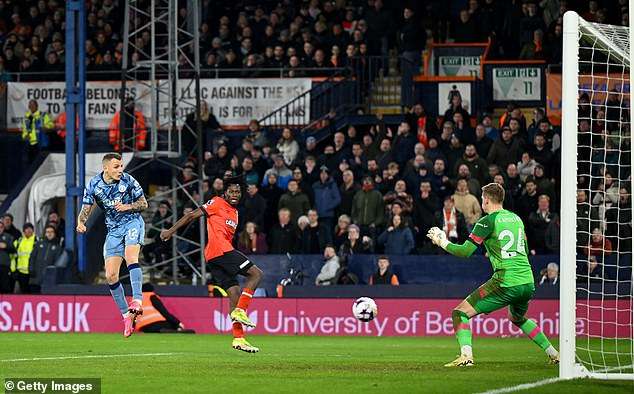 Luton 2-3 Aston Villa: Sub Lucas Digne heads home late winner for visitors after blowing two-goal lead to boost top-four hopes… with Hatters four points from safety after defeat