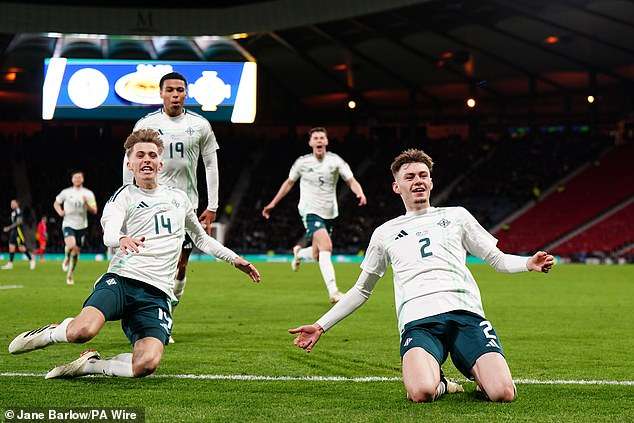 Scotland 0-1 Northern Ireland: Conor Bradley’s first international goal seals victory at Hampden Park as Liverpool star smashes in superb strike… with Andy Robertson going off injured for the hosts