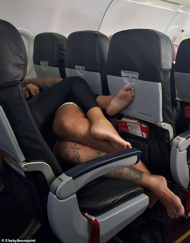 Plane passenger is left horrified by canoodling couple who spent entire four-hour flight SPOONING while lying down across a row of seats BAREFOOT