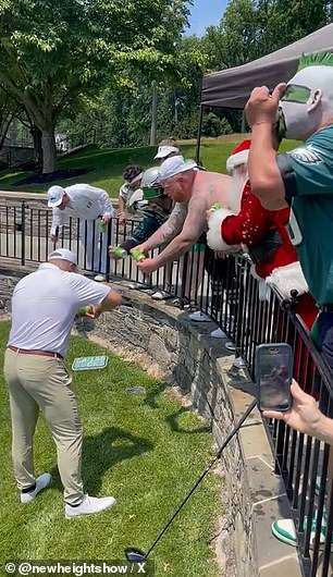 Jason Kelce shotguns beers at his charity golf tournament ahead of team debut with Travis