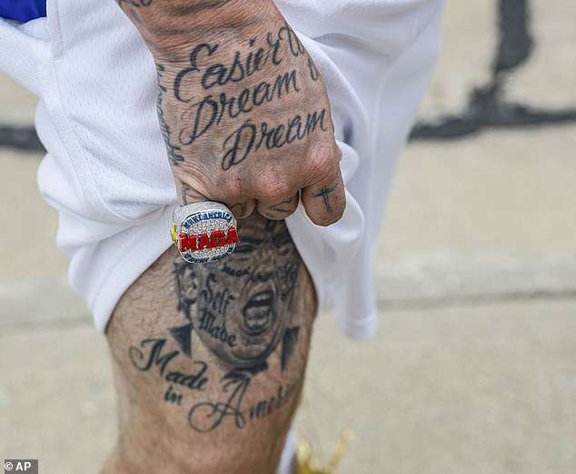 MAGA fans show off Trump tattoos and mugshot t-shirts as they line up hours before his Wisconsin rally… days after he called Milwaukee a ‘horrible city’