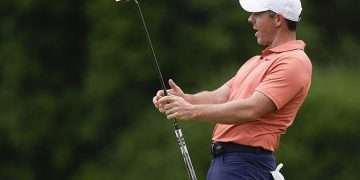 Rory McIlroy seen WITHOUT wedding ring again despite Erica Stoll divorce U-turn as he tees off alongside Scottie Scheffler in US Open first round