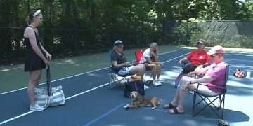 Pickleball players in ritzy suburb stage furious protest as town hires SECURITY to block them from using tennis courts