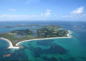 Six of the best CAR-FREE islands to visit, from a time-warp spot in the U.S to a dreamy location with the ‘world’s best beach’ – and a gem off the Cornish coast surrounded by aquamarine seas