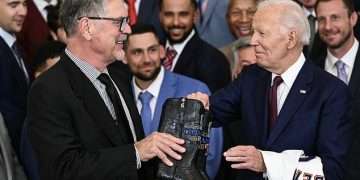Bumbling Biden, 81, asks Texas Rangers pitcher ‘who the hell made his haberdasher’ and says ‘I like his dress man’ at White House World Series celebration
