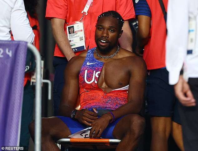 Noah Lyles has COVID but insists he has NO regrets about running 200m – despite needing to be wheeled off the track in Paris
