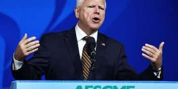 Tim Walz gives furious response to claims he lied about his military record and reveals his message to fellow veteran J.D. Vance