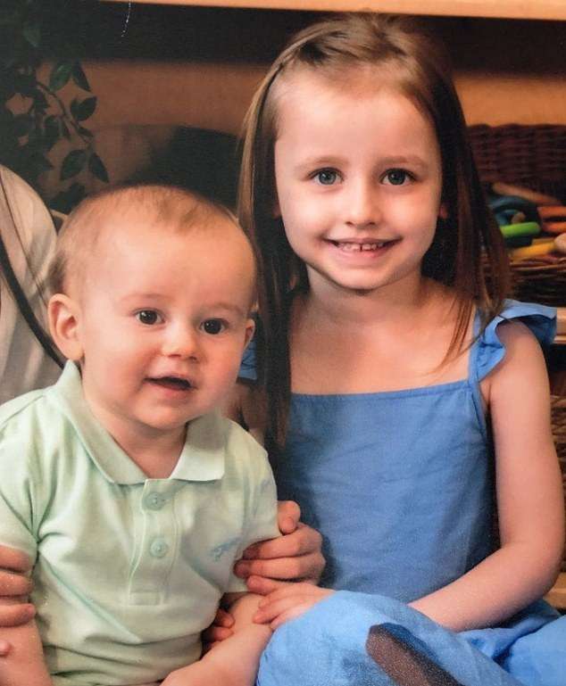 Two children saved from car fire by a quick-thinking hero who smashed the windows with his golf club