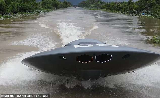 Out of this world! Inventor builds a fully functional flying saucer-inspired jet boat – as incredible footage shows the vehicle reaching 31mph as it skims across the water