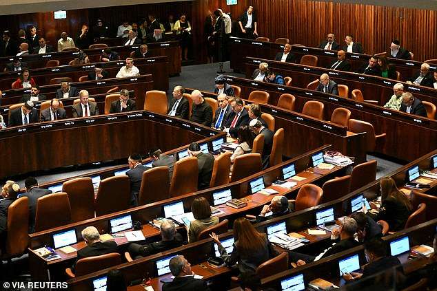 ‘Gravely concerned’: Israel passes legislation that could threaten UN’s work in providing aid to Gaza as UK politicians weigh in on call