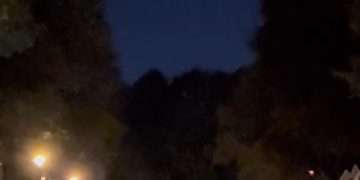 The swarm of UFOs caught on video near US Air Force base by dozens of stunned onlookers