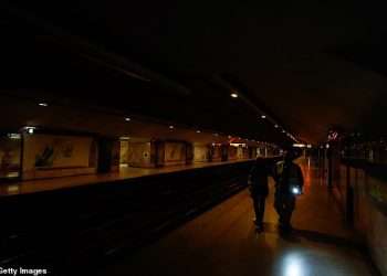 Panic grips blackout stricken Spain as residents are told to stay indoors, huge queues form for food and petrol – and it could take TEN HOURS to restore power