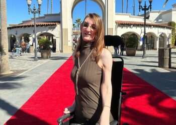 World’s tallest woman forced to book SIX plane seats and has to be carried on via stretcher when she flies