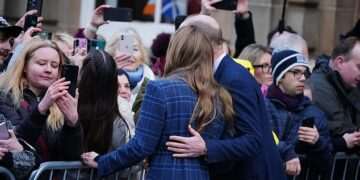 Sweet moment Prince of Wales puts his arm around Kate as pair enjoy fun-filled day of engagements in Scotland (and William enjoys a cheeky pint!)