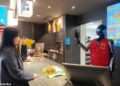 McDonald’s is testing humanoid ROBOTS in Shanghai – and they even wear the uniform