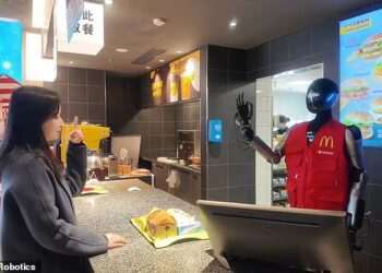McDonald’s is testing humanoid ROBOTS in Shanghai – and they even wear the uniform