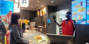 McDonald’s is testing humanoid ROBOTS in Shanghai – and they even wear the uniform