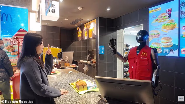 McDonald’s is testing humanoid ROBOTS in Shanghai – and they even wear the uniform