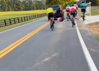 Terrifying video shows why Honda driver was charged with assault after encountering large group of cyclists pedaling down road