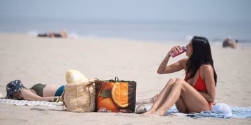 Millions told to ‘stay out of the sun’ as dangerous triple-digit heat scorches 14 states in just HOURS