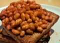Baked beans will come out of the pot tastier if you stir 1 common ingredient into the sauce