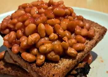 Baked beans will come out of the pot tastier if you stir 1 common ingredient into the sauce