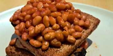 Baked beans will come out of the pot tastier if you stir 1 common ingredient into the sauce