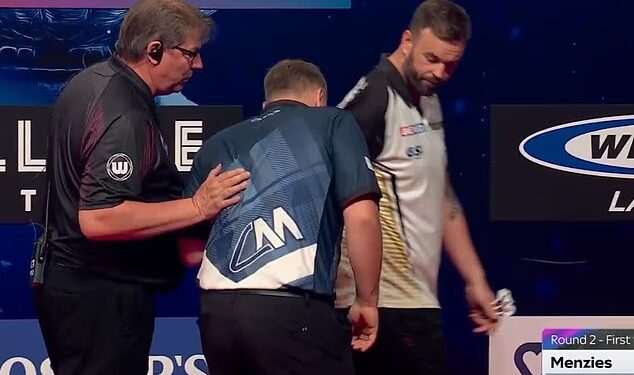 Darts star has to be helped off stage after suffering health scare during World Matchplay clash as he’s forced to withdraw from tournament