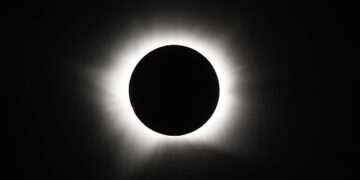 Solar eclipse in pictures: Stunning snaps show the moment the moon covered the face of the sun